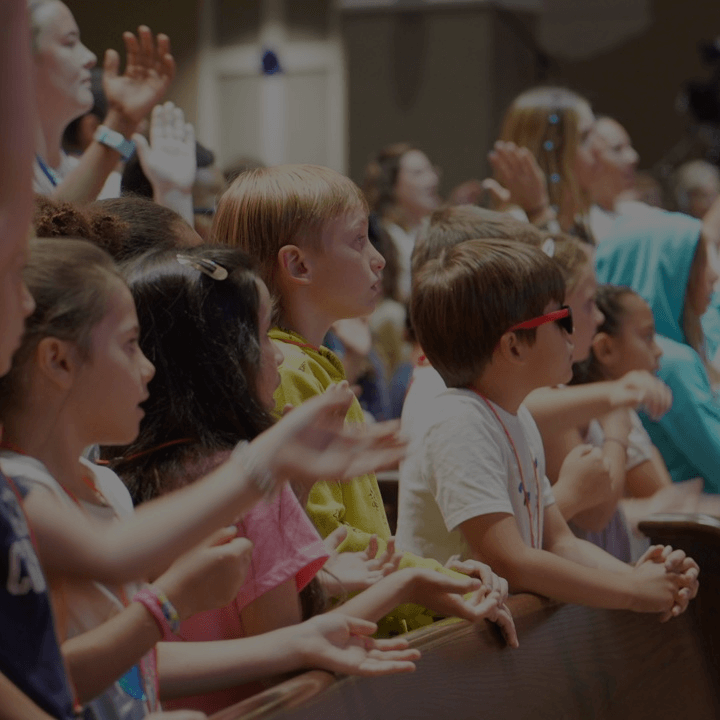 group of kids pointing right